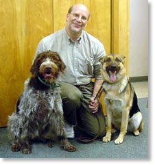 Dr. Carron and his dogs